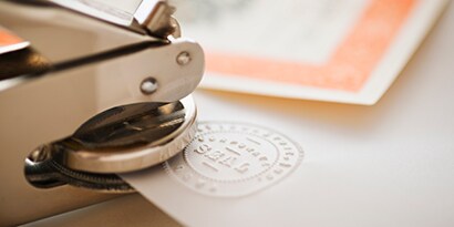 embossed seal stamped onto a certificate
