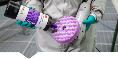 Painter polishing a car panel
