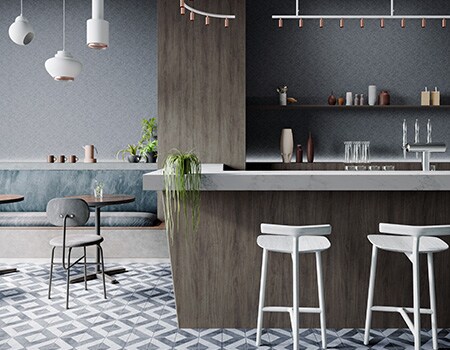 Beachy-looking cafe interior with blue tones, stone and wood 3M Architectural Finishes.
