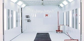 a car paint booth showing walls and floor protected with the 3M Dirt trap protection materials
