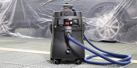 Image of clean sanding system in a body shop
