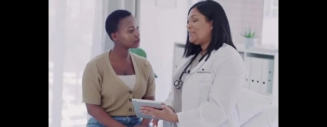 Doctor having a conversation with a patient
