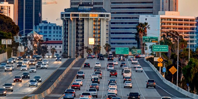 Busy road entering a city
