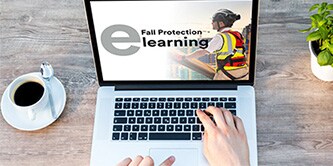 Open laptop showing homepage of 3M eLearning platform
