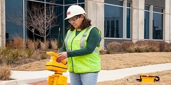  Image showing women wearing 3M helmet and reflective vest
