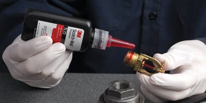 3M™ Scotch-Weld™ Threadlocker TL72 being applied to ceiling fire sprinkler
