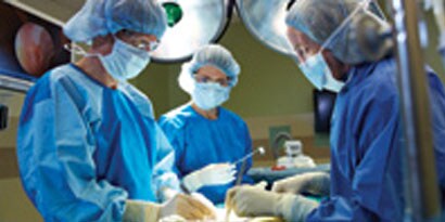 OR staff operating on a patient
