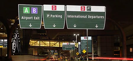 Reflective road signs for airport directions
